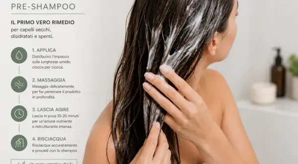 Donna applica un impacco pre-shampoo nutriente sui capelli lunghi e umidi, massaggiando per un trattamento profondo.