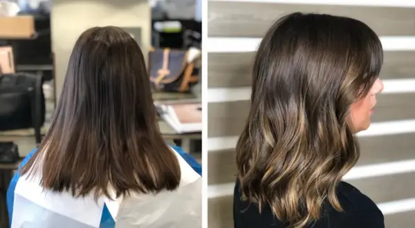 Capelli castani trasformati con schiariture delicate e onde morbide, un perfetto effetto tono su tono.