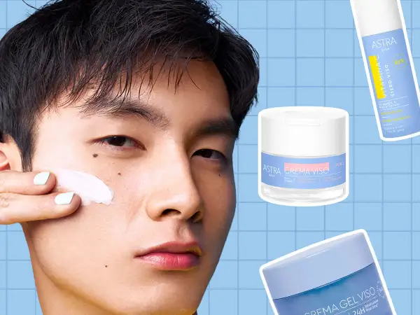 Un uomo applica una crema viso. Accanto, i prodotti Astra: siero viso Vitamina C e crema viso. La domanda è: si mette prima il siero o la crema?